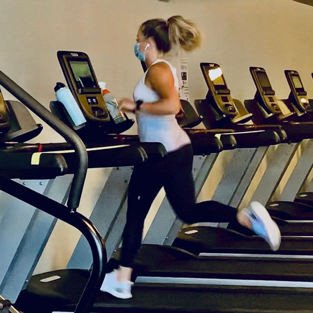 Member running on a treadmill