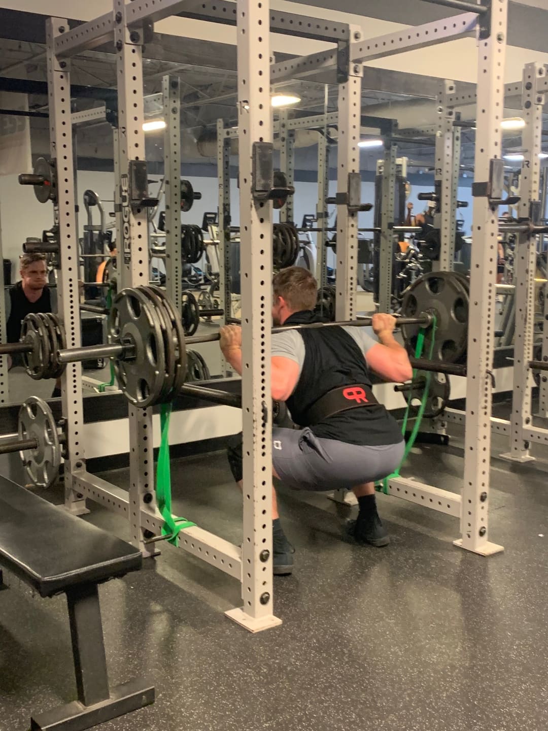 Member training in a power rack